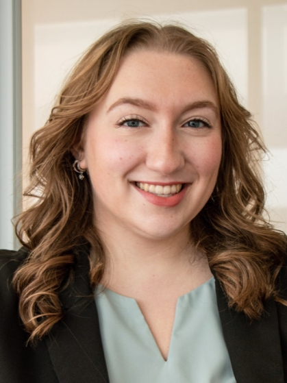 Allison Smith, curly hair, black blazer, mint green shirt