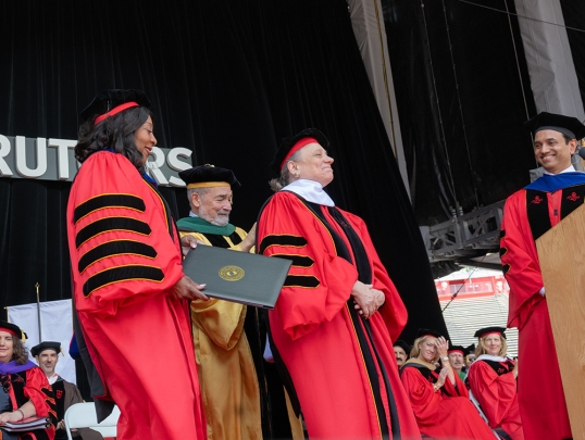 Laurie L. Patton, president of the American Academy of Arts & Sciences, receives an honorary doctor of letters degree from Rutgers University
